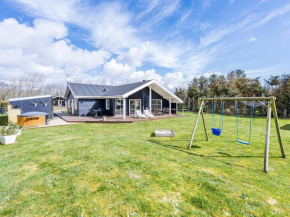 6 person holiday home on a holiday park in Tarm